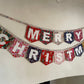Merry Christmas bunting made with an array of Liberty London Christmas prints