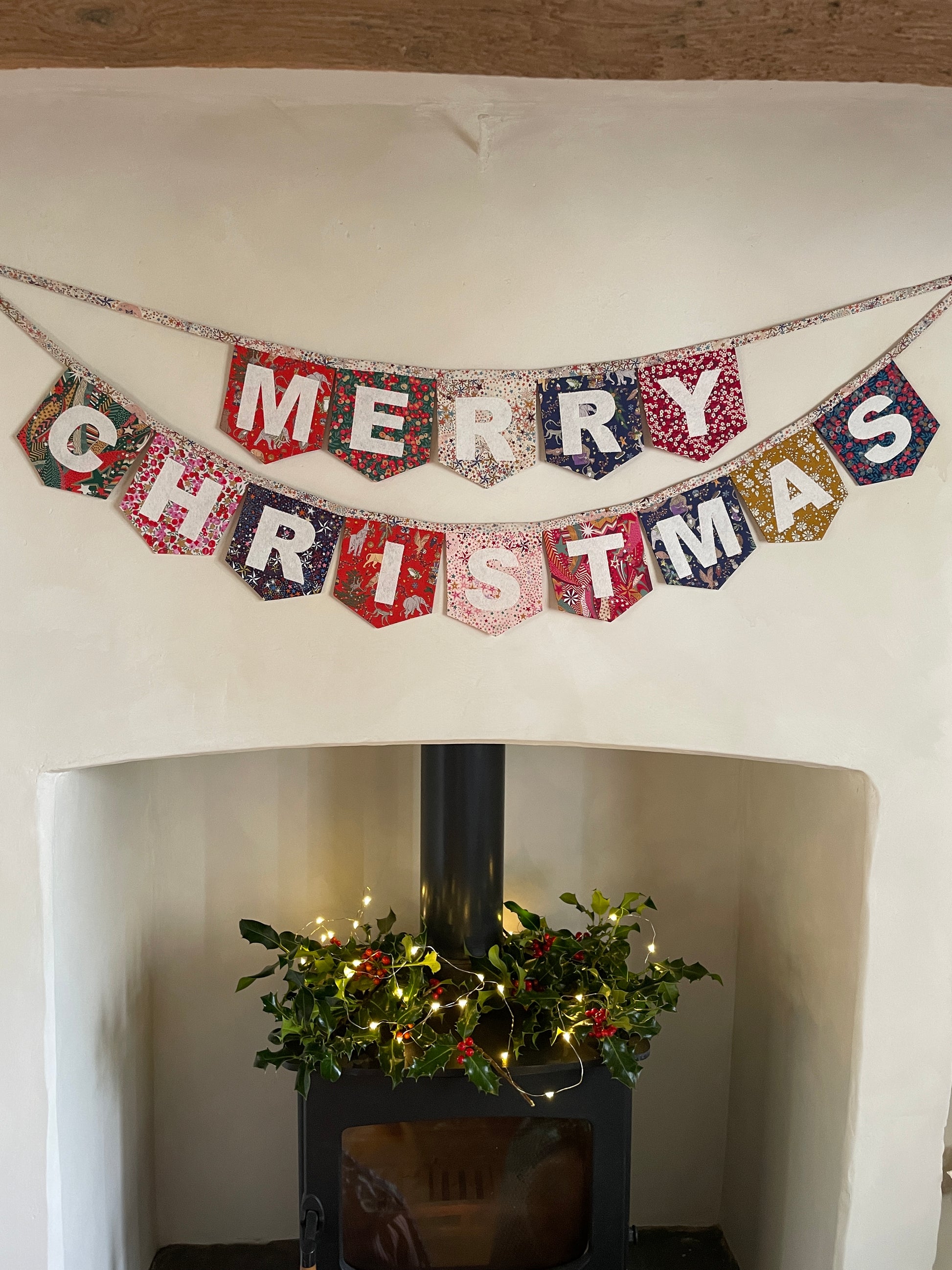 Merry Christmas bunting made with an array of Liberty London Christmas prints